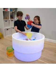 Mesa de luz sensorial de arena y agua